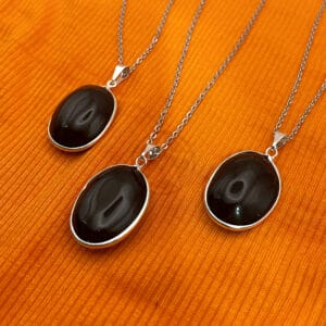 Dije Obsidiana Negra Ovalo Con Virola